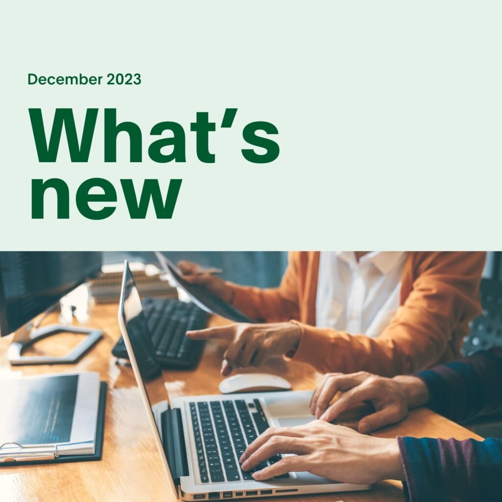 Picture of computers and "December 2023" and "What's new" text.