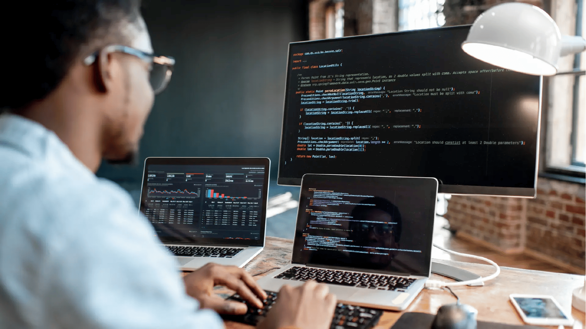 person with code on computer screen